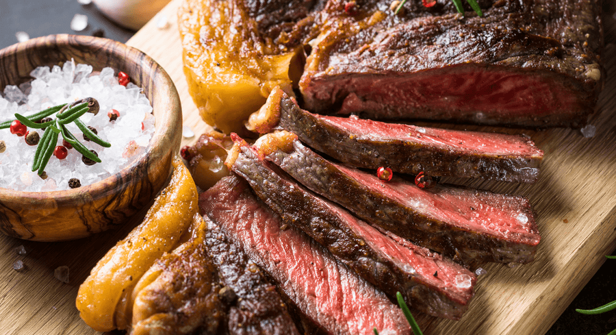 Coffee-Crusted Steak with Roadhouse Rub & Charred Scallion Butter